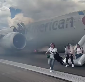 Incendio en tren de aterrizaje obliga a evacuar avión de American Airlines